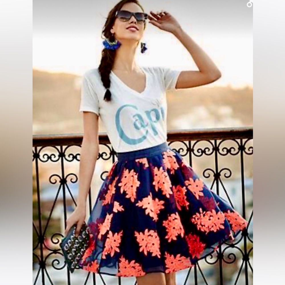 Maeve Blue and Orange Embellished Skirt
Size M/L Anthropologie